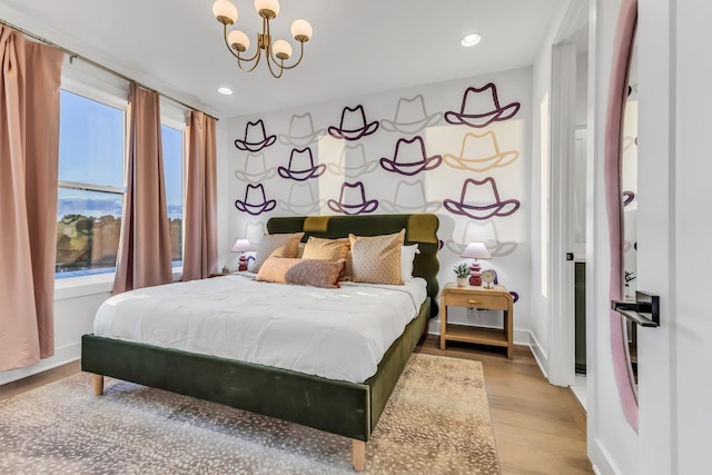 2176 Carson St Unit 5, Nashville, TN 37211 - bedroom featuring light wood finished floors, a chandelier, baseboards, and recessed lighting
