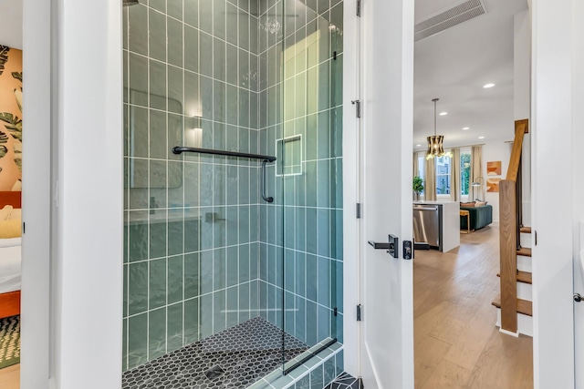 2176 Carson St Unit 5, Nashville, TN 37211 - bathroom featuring connected bathroom, wood finished floors, visible vents, a shower stall, and recessed lighting