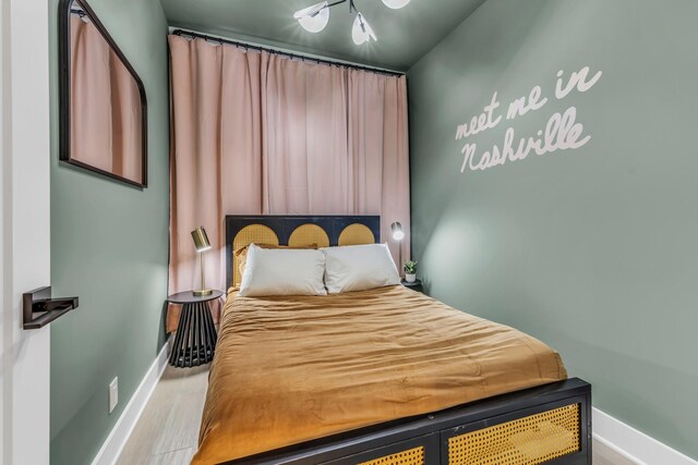 2176 Carson St Unit 5, Nashville, TN 37211 - bedroom featuring baseboards and wood finished floors