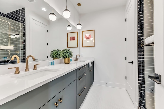 2176 Carson St Unit 5, Nashville, TN 37211 - full bathroom with baseboards, tiled shower, double vanity, and a sink