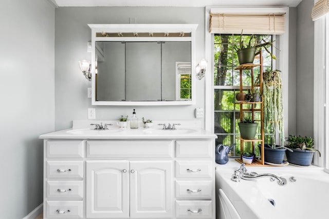 460 Seven Springs Rd, Clarksville, TN 37043 - bathroom with a sink, double vanity, and a garden tub