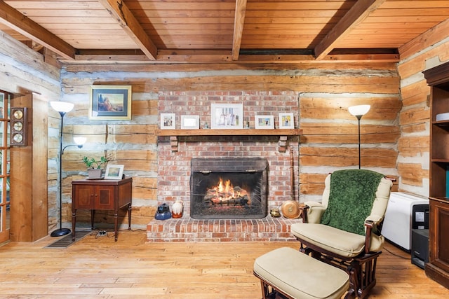 460 Seven Springs Rd, Clarksville, TN 37043 - living area featuring wood walls, beam ceiling, a fireplace, wood-type flooring, and wood ceiling