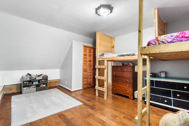 460 Seven Springs Rd, Clarksville, TN 37043 - bedroom with baseboards, a closet, and wood finished floors