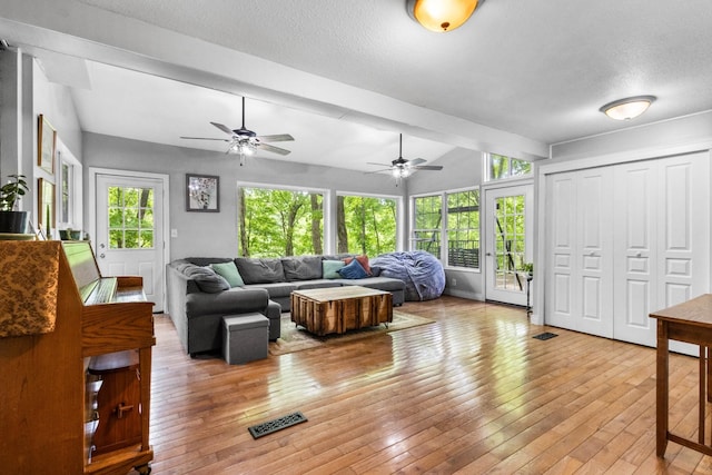460 Seven Springs Rd, Clarksville, TN 37043 - living area featuring light wood-type flooring, visible vents, a ceiling fan, and beamed ceiling
