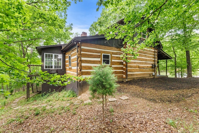 460 Seven Springs Rd, Clarksville, TN 37043 - view of side of property with a chimney and log siding