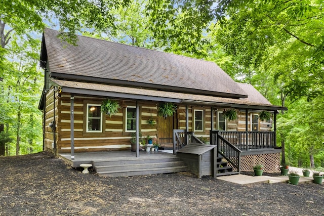 460 Seven Springs Rd, Clarksville, TN 37043 - rear view of property featuring covered porch and a shingled roof