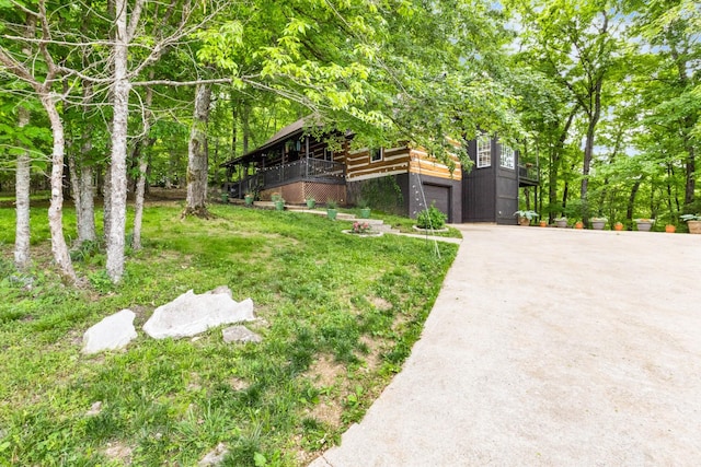 460 Seven Springs Rd, Clarksville, TN 37043 - exterior space with an attached garage, a front lawn, and driveway