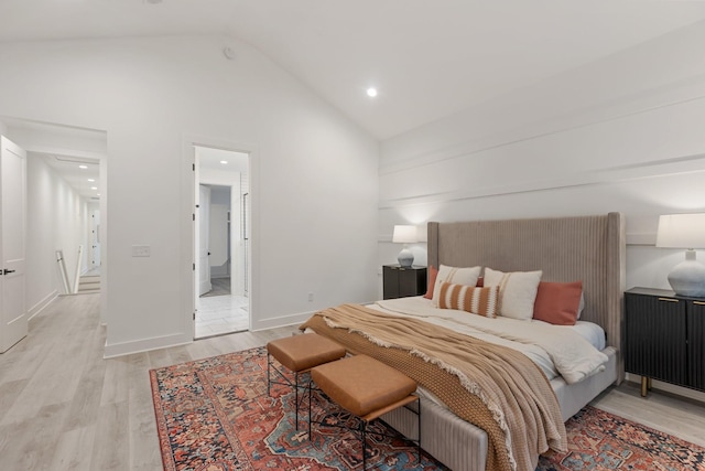bedroom featuring recessed lighting, light wood-style flooring, and high vaulted ceiling