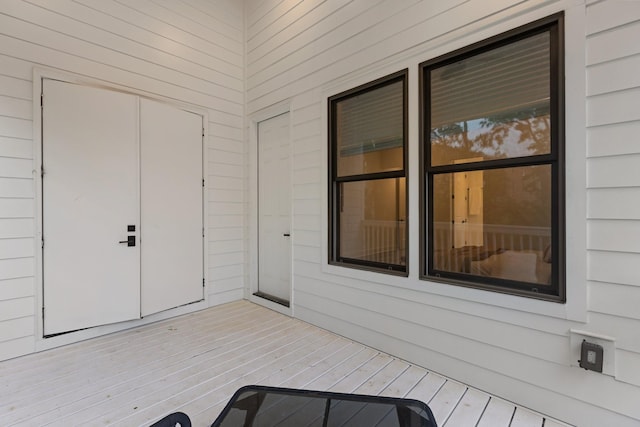 entrance to property featuring a deck