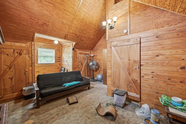 interior space featuring carpet flooring, wood ceiling, wood walls, and lofted ceiling