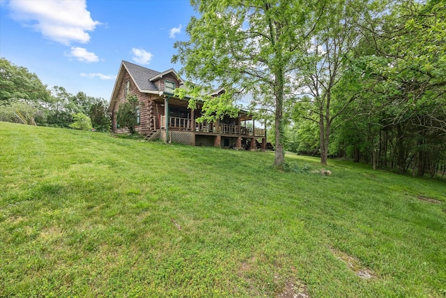 view of yard with a deck