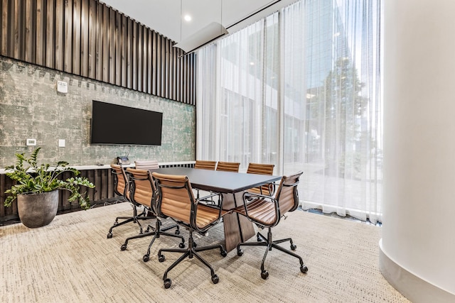 home office featuring a towering ceiling