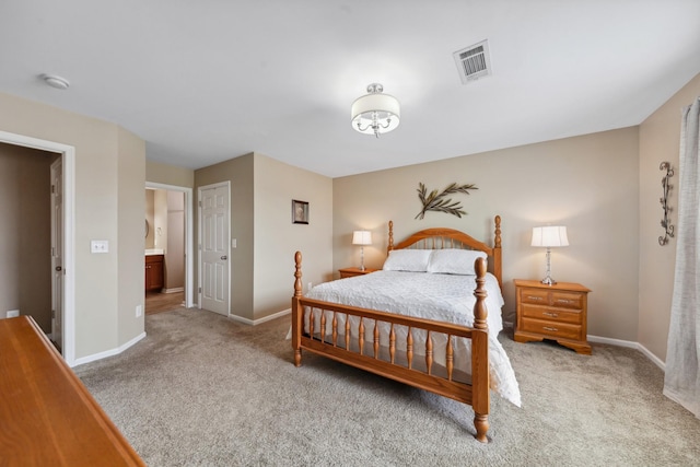 bedroom with baseboards, visible vents, and carpet floors