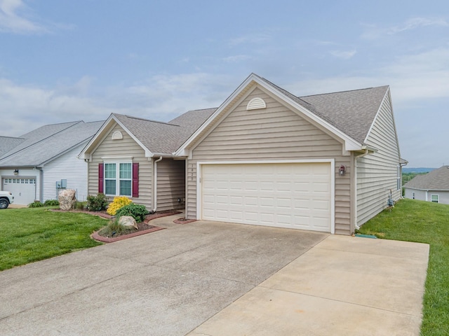 ranch-style home featuring roof with shingles, a garage, a front lawn, and driveway