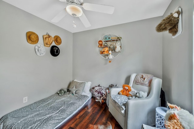 bedroom featuring wood finished floors and ceiling fan