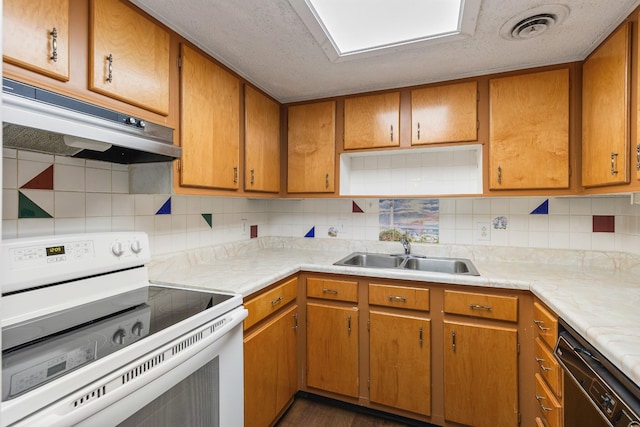 kitchen featuring a sink, visible vents, under cabinet range hood, white electric range, and dishwasher