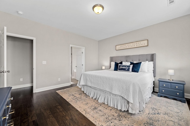 567 Oakvale Ln, Mount Juliet, TN 37122 - bedroom with wood finished floors, baseboards, and ensuite bath