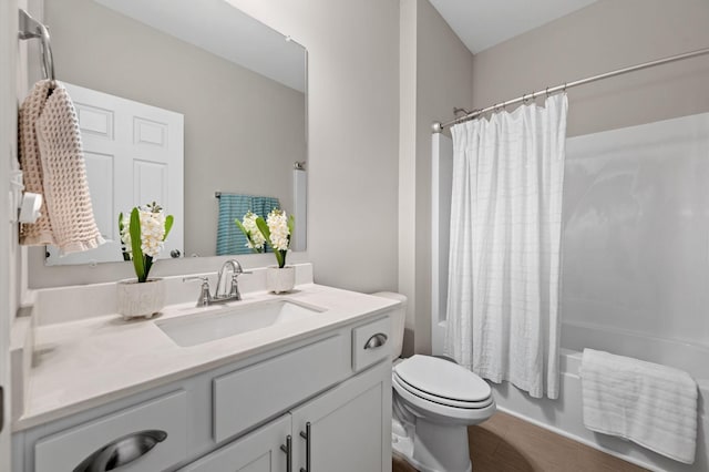 567 Oakvale Ln, Mount Juliet, TN 37122 - bathroom with toilet, vanity, shower / bath combination with curtain, and wood finished floors