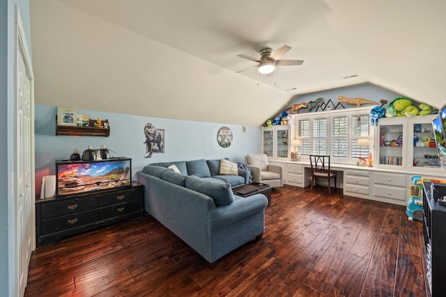 living room featuring a ceiling fan, lofted ceiling, and dark wood-style floors