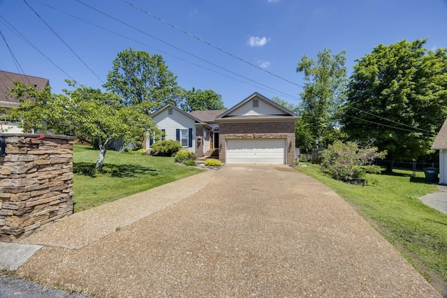 2004 Pinewood Ct, Mount Juliet, TN 37122 - ranch-style house with brick siding, concrete driveway, and an attached garage