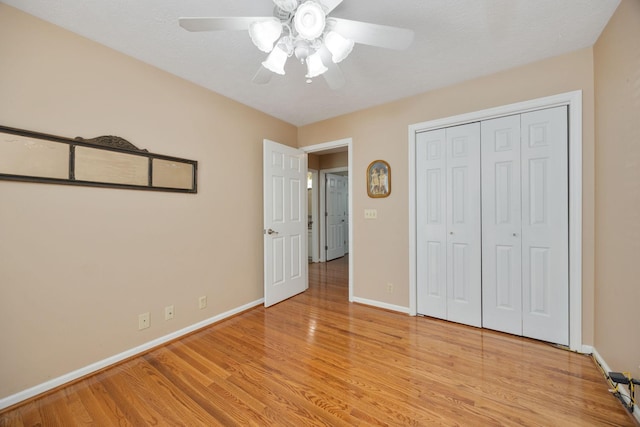 2004 Pinewood Ct, Mount Juliet, TN 37122 - unfurnished bedroom featuring baseboards, light wood finished floors, a closet, and ceiling fan