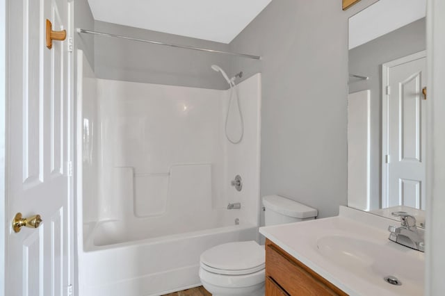 full bathroom featuring toilet,  shower combination, and vanity
