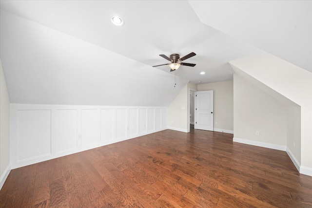 additional living space featuring lofted ceiling, recessed lighting, ceiling fan, and dark wood-type flooring