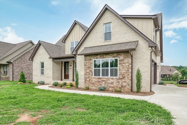 craftsman house featuring board and batten siding, stone siding, a shingled roof, concrete driveway, and a front yard