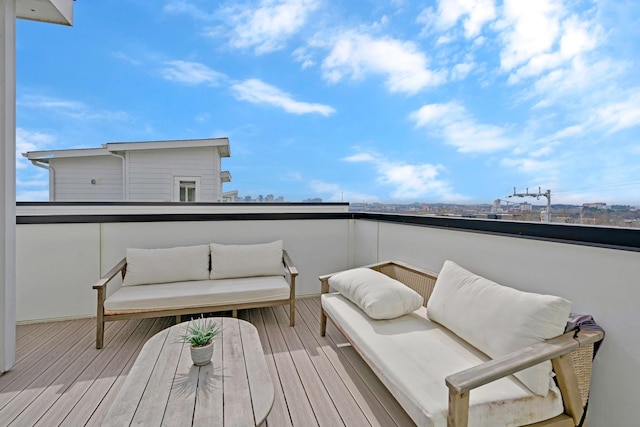 wooden deck featuring outdoor lounge area