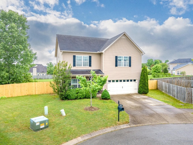 5002 Fox Run S, Spring Hill, TN 37174 - traditional-style house with fence, an attached garage, concrete driveway, a front lawn, and board and batten siding