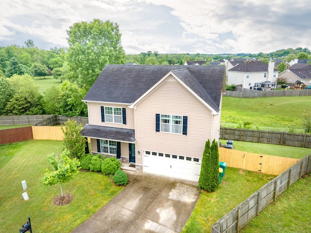 5002 Fox Run S, Spring Hill, TN 37174 - traditional home with board and batten siding, driveway, a garage, a front yard, and roof with shingles