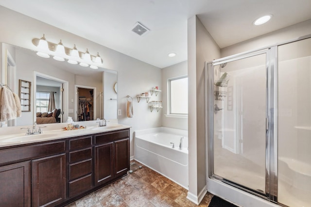 5002 Fox Run S, Spring Hill, TN 37174 - full bath featuring plenty of natural light, visible vents, a stall shower, and a sink