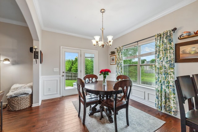 5002 Fox Run S, Spring Hill, TN 37174 - dining area with a chandelier, ornamental molding, dark wood-style flooring, and a healthy amount of sunlight