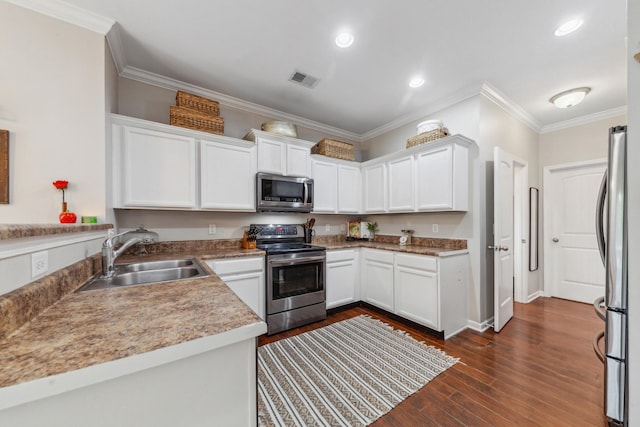 5002 Fox Run S, Spring Hill, TN 37174 - kitchen featuring a sink, crown molding, stainless steel appliances, and white cabinetry