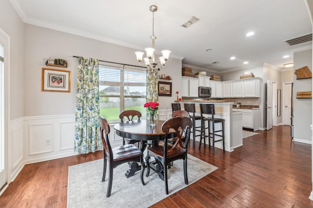 5002 Fox Run S, Spring Hill, TN 37174 - dining room with ornamental molding, a chandelier, recessed lighting, and dark wood-type flooring