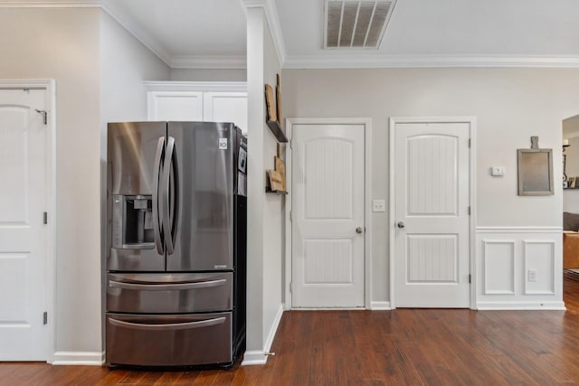 5002 Fox Run S, Spring Hill, TN 37174 - kitchen with visible vents, dark wood finished floors, crown molding, white cabinets, and stainless steel fridge with ice dispenser