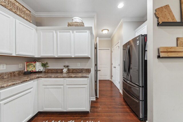5002 Fox Run S, Spring Hill, TN 37174 - kitchen with stainless steel fridge with ice dispenser, white cabinetry, and ornamental molding