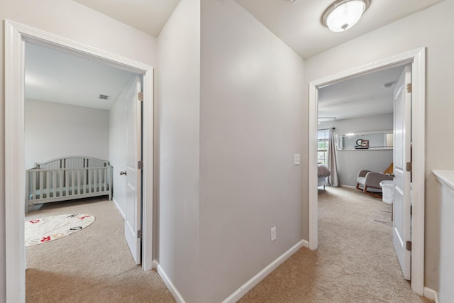5002 Fox Run S, Spring Hill, TN 37174 - corridor with baseboards, carpet flooring, and visible vents