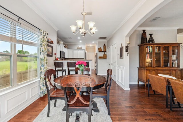 5002 Fox Run S, Spring Hill, TN 37174 - dining space featuring ornamental molding, a notable chandelier, and visible vents