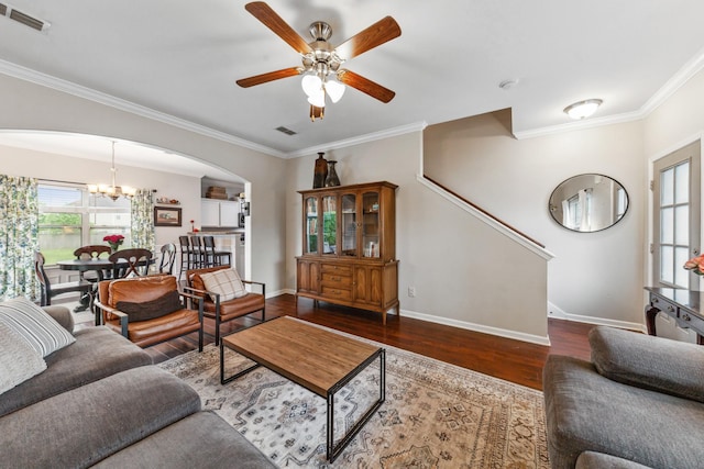 5002 Fox Run S, Spring Hill, TN 37174 - living area with arched walkways, ceiling fan with notable chandelier, visible vents, and wood finished floors