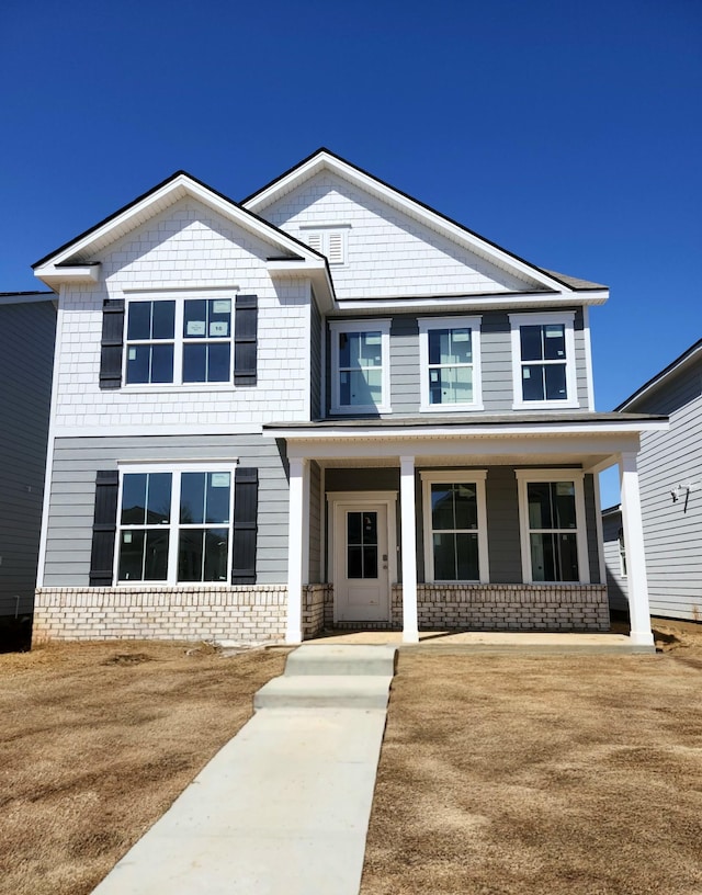 craftsman house featuring covered porch