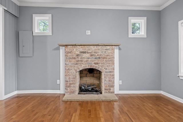 455 No Pone Valley Rd NW, Georgetown, TN 37336 - unfurnished living room with electric panel, crown molding, wood finished floors, and a healthy amount of sunlight