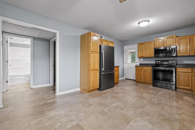 455 No Pone Valley Rd NW, Georgetown, TN 37336 - kitchen with stainless steel appliances, baseboards, dark countertops, and visible vents