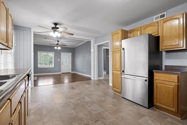 455 No Pone Valley Rd NW, Georgetown, TN 37336 - kitchen with freestanding refrigerator, ornamental molding, visible vents, a ceiling fan, and baseboards