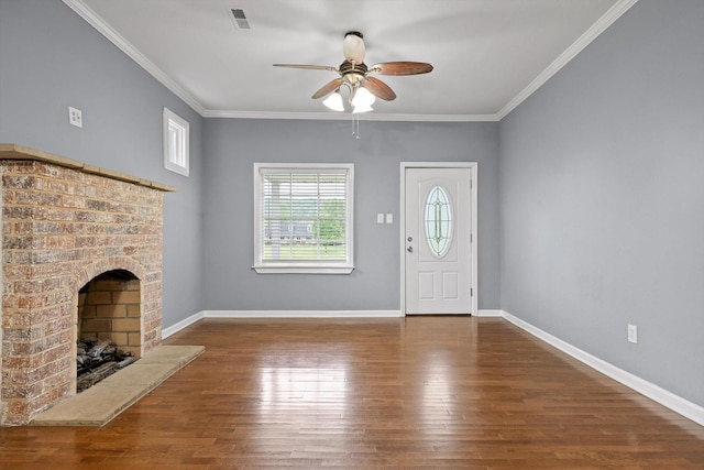 455 No Pone Valley Rd NW, Georgetown, TN 37336 - foyer entrance with crown molding, a brick fireplace, a ceiling fan, and wood finished floors