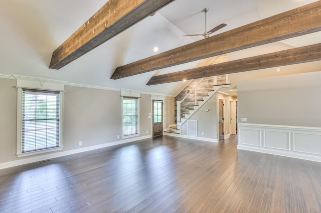 unfurnished living room featuring a wealth of natural light, visible vents, lofted ceiling with beams, and stairs