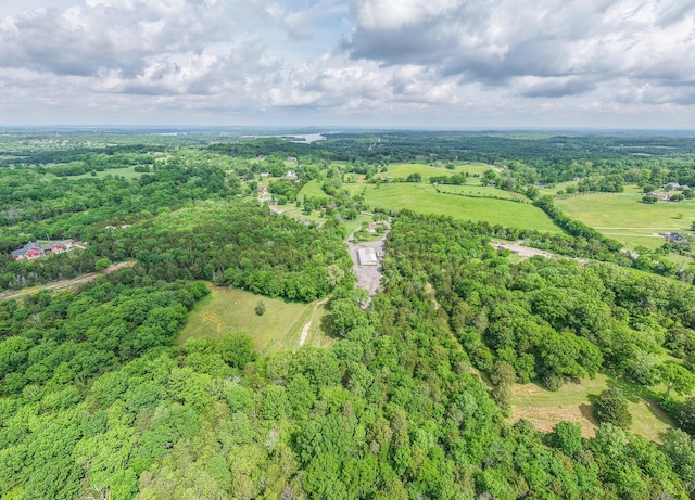 aerial view featuring a view of trees