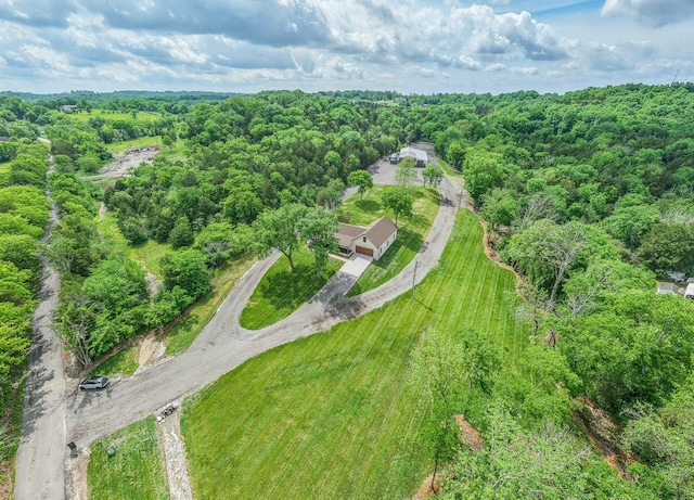 aerial view featuring a forest view