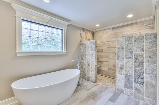 full bathroom featuring wood finished floors, a soaking tub, walk in shower, ornamental molding, and recessed lighting