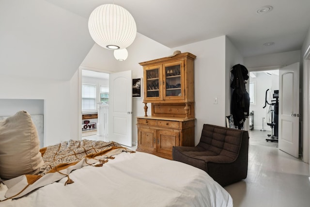 bedroom with lofted ceiling